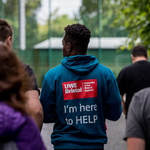 A UWE representative leads a group of prospective students.