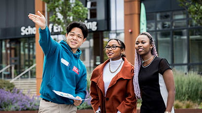 Student Ambassador giving help at Open Day