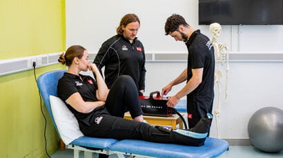 Students practicing using equipment for sports rehabilitation